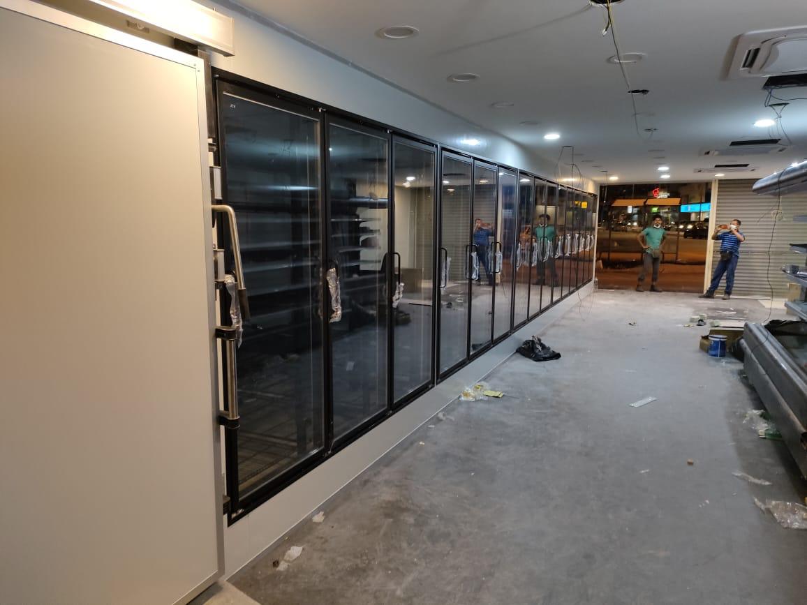 Multi-door glass display chiller wall during installation