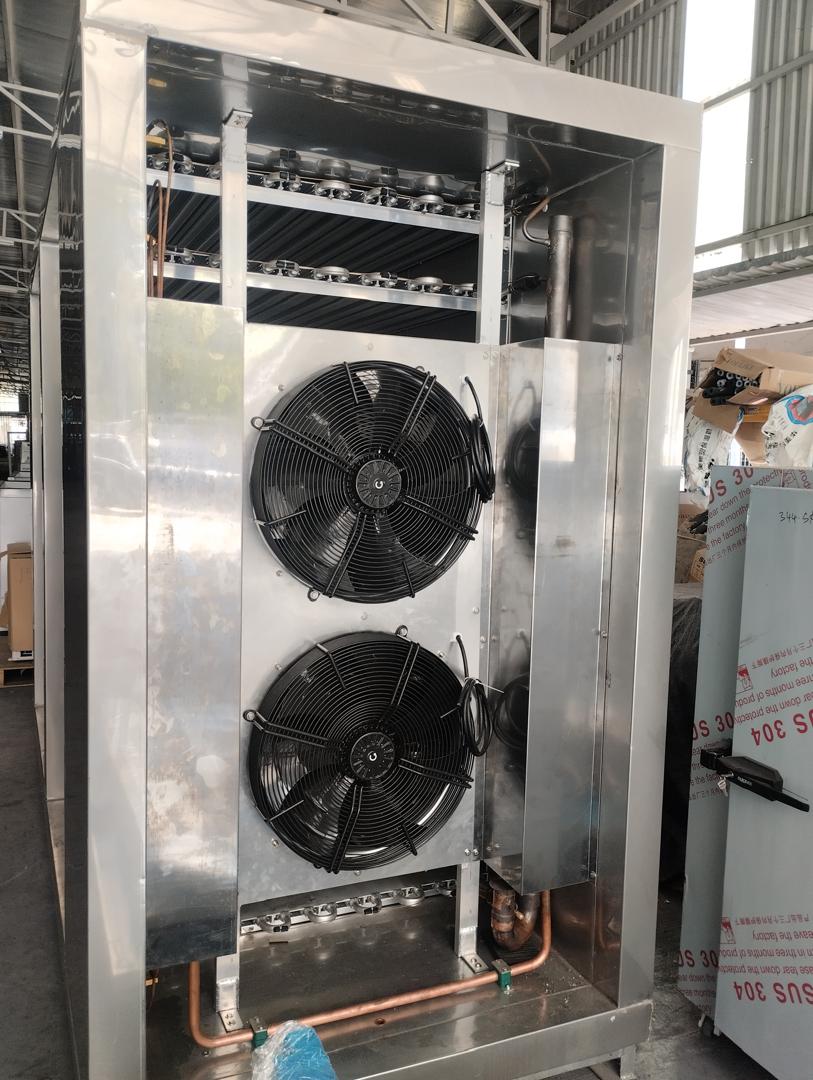Twin-fan evaporator coil unit for cold room refrigeration